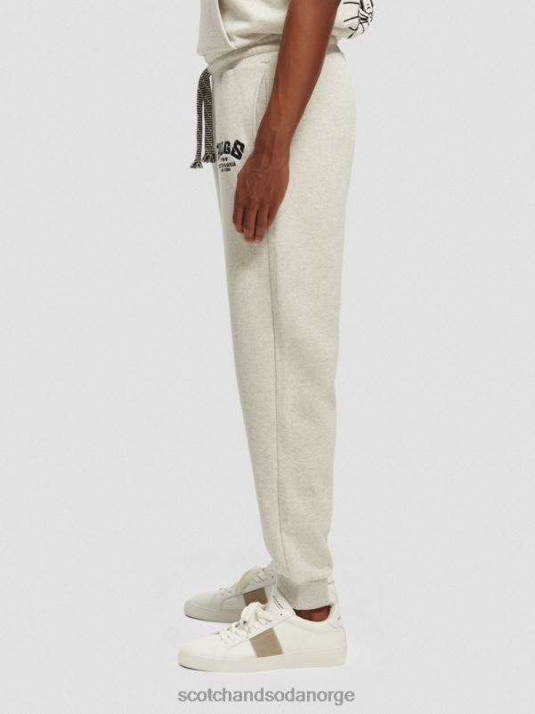 kvinner looney tunes broderte joggebukser off white melange N40XD185 klær Scotch & Soda